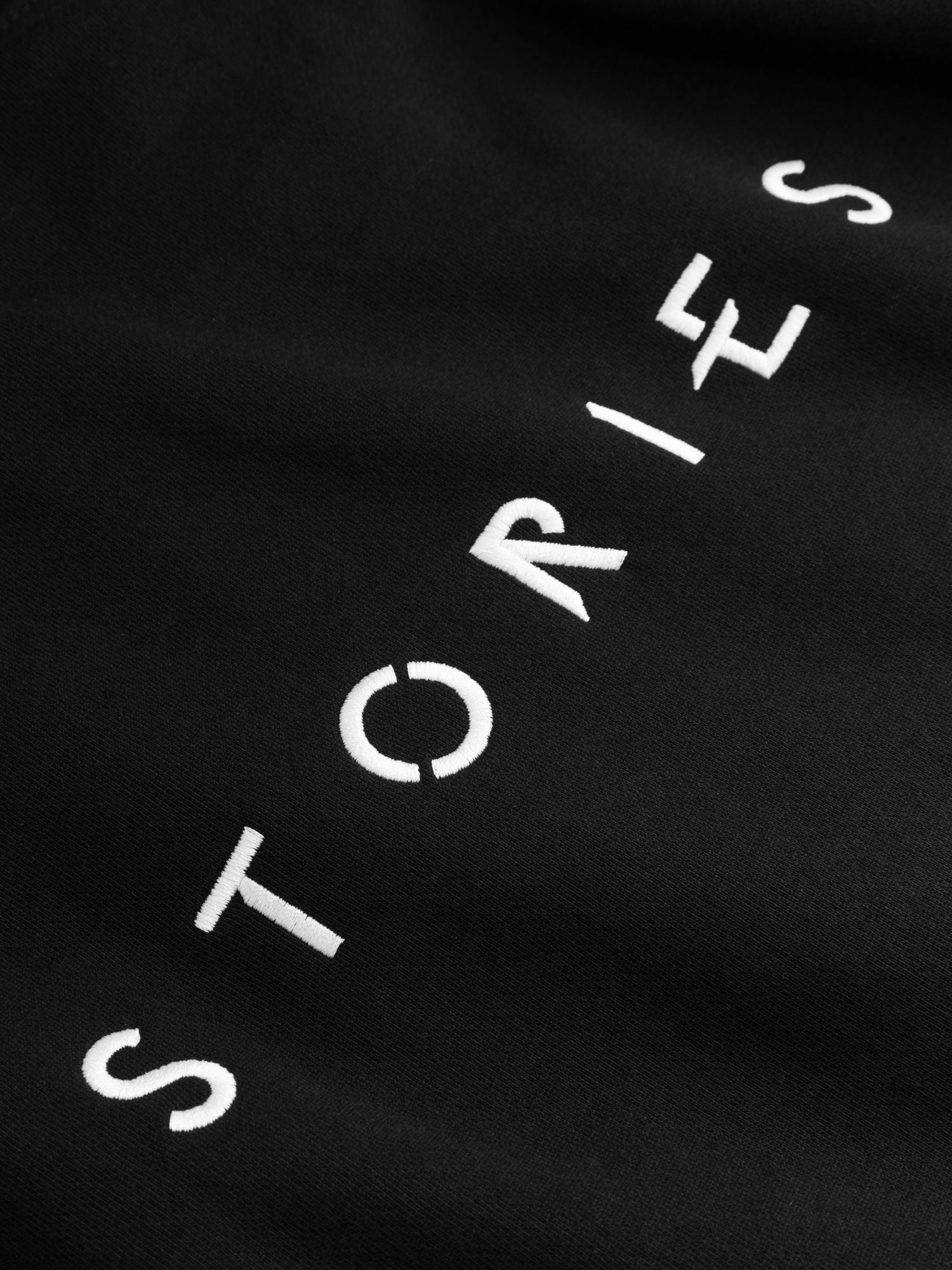 Avicii Stories Zip hood Black – Avicii Official Merchandise